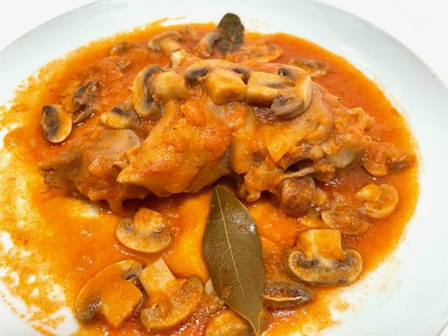 Peu de porc amb xampinyons.